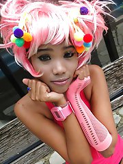 Petite emo Thai girl Poy is out side and decides to strip and show her tits